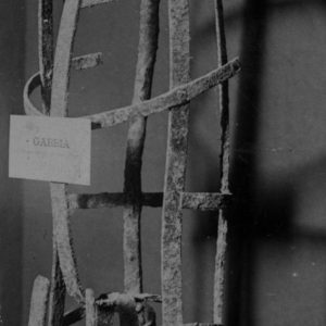 An iron cage found in Milazzo, which contained some human remains and Inniskilling uniform buttons
