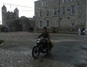 John on the 350cc BSA Motorbike - promoted to Sergeant for the day!