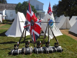 Re-enactment group's piled muskets and packs