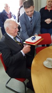 George receiving his birthday cake