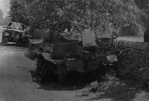 Sicily 1943. Inniskilling bren gun carrier destroyed (front) and knocked out Italian tank (rear)